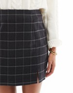 notch front tailored skirt in dark grey melange with windowpane check