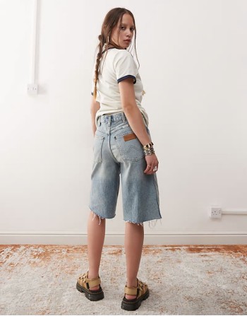 jorts in light wash blue