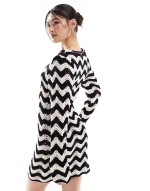 crochet bell sve mini beach dress in cream & black chevron print